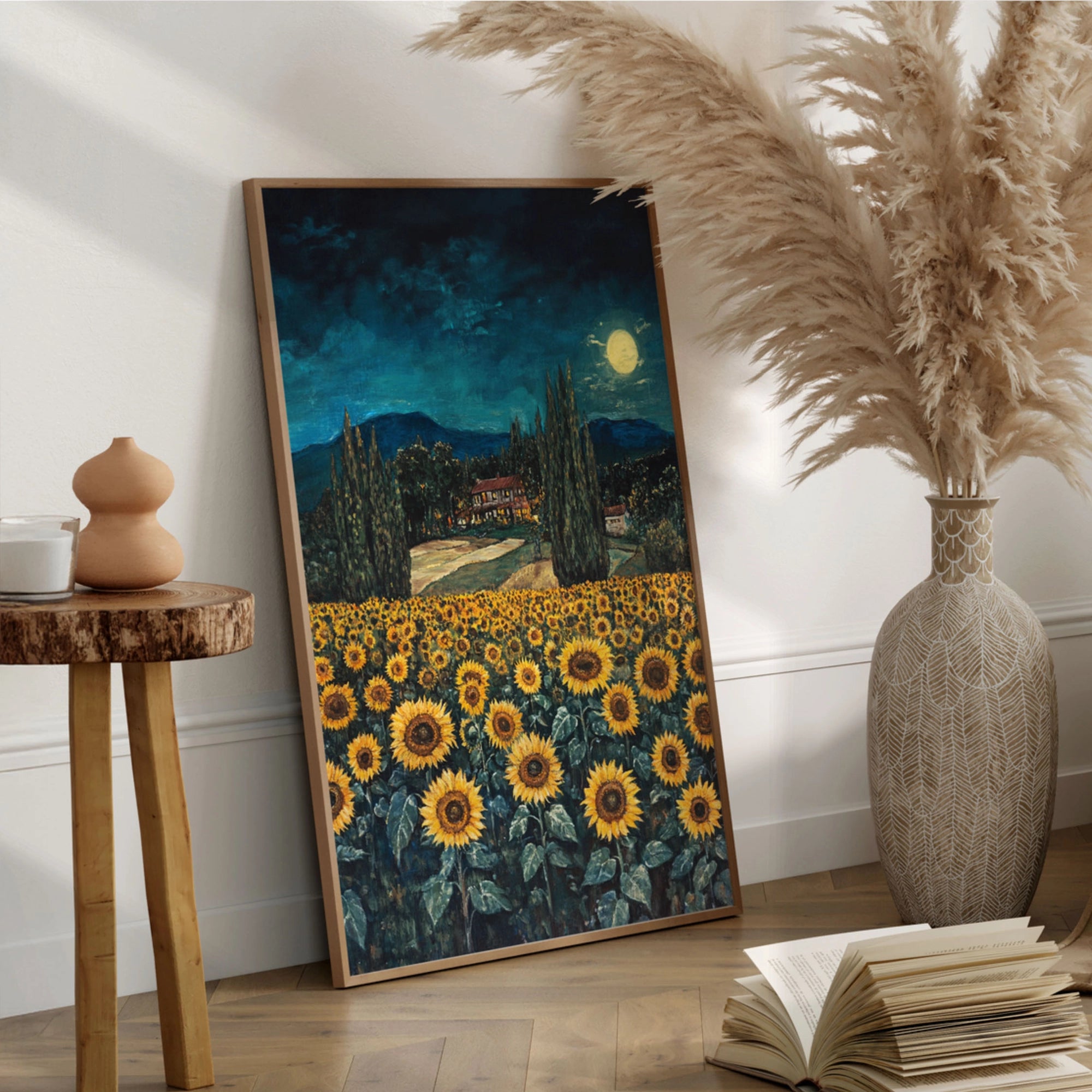 Sunflower field painting with a moonlit night sky, featuring a house and trees in the background, displayed as wall art in a cozy living room setting.